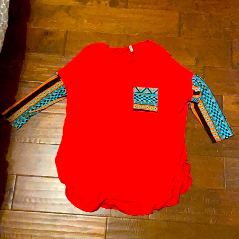 Burnt orange top.